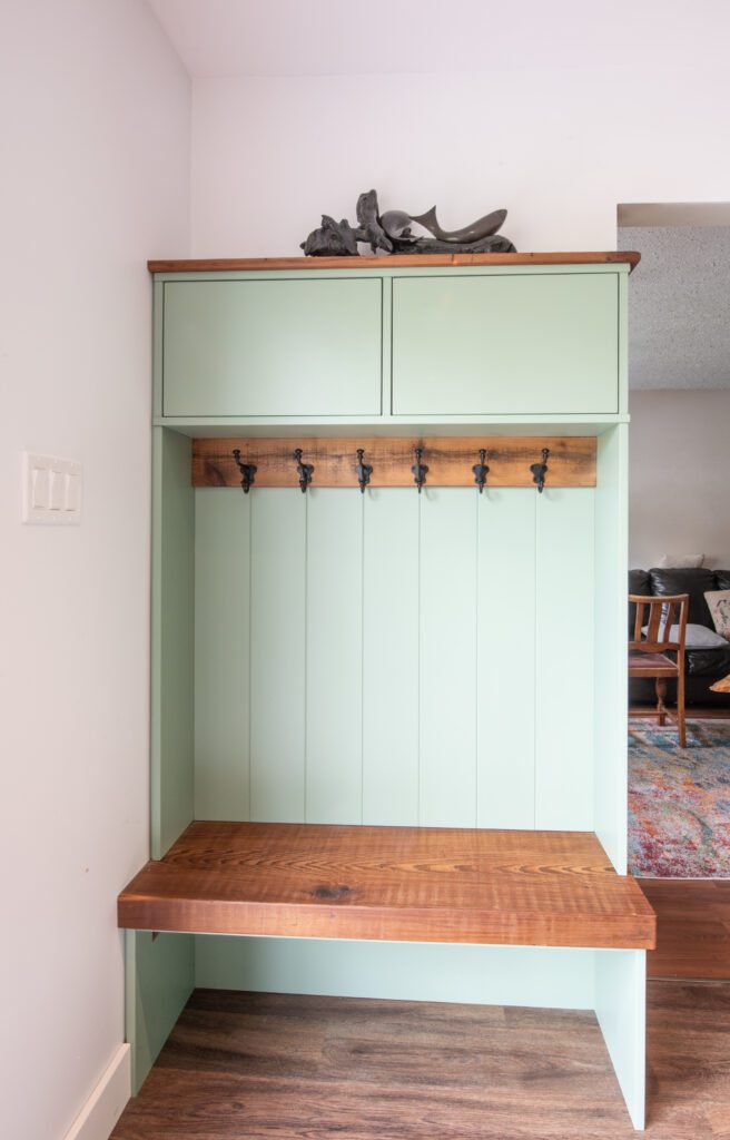 Kitchen cabinets and entryway storage/cabinetry.
