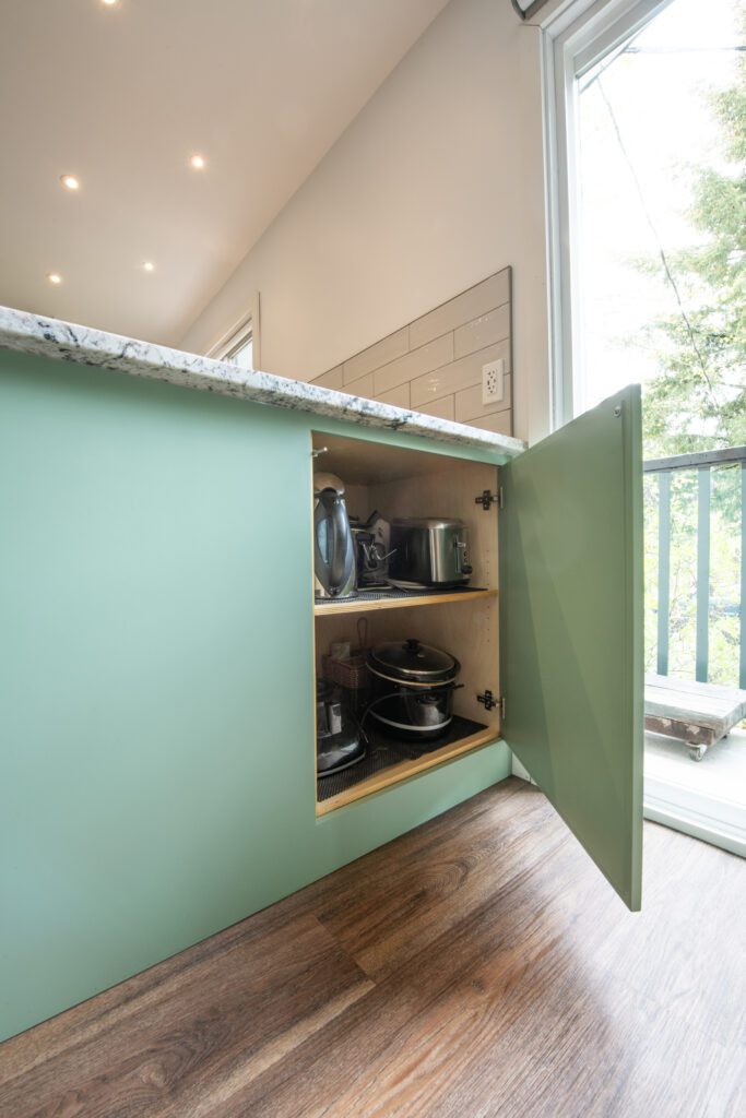 Kitchen cabinets and entryway storage/cabinetry.
