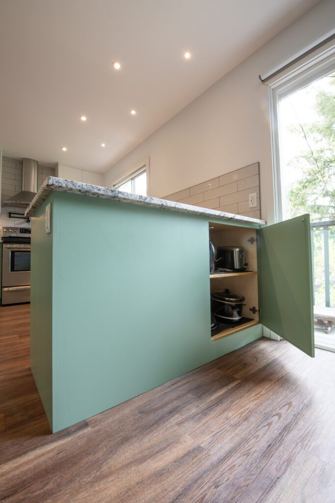 Kitchen cabinets and entryway storage/cabinetry.
