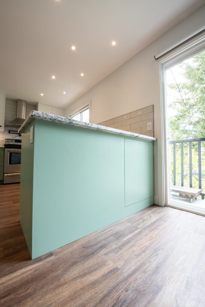 Kitchen cabinets and entryway storage/cabinetry.
