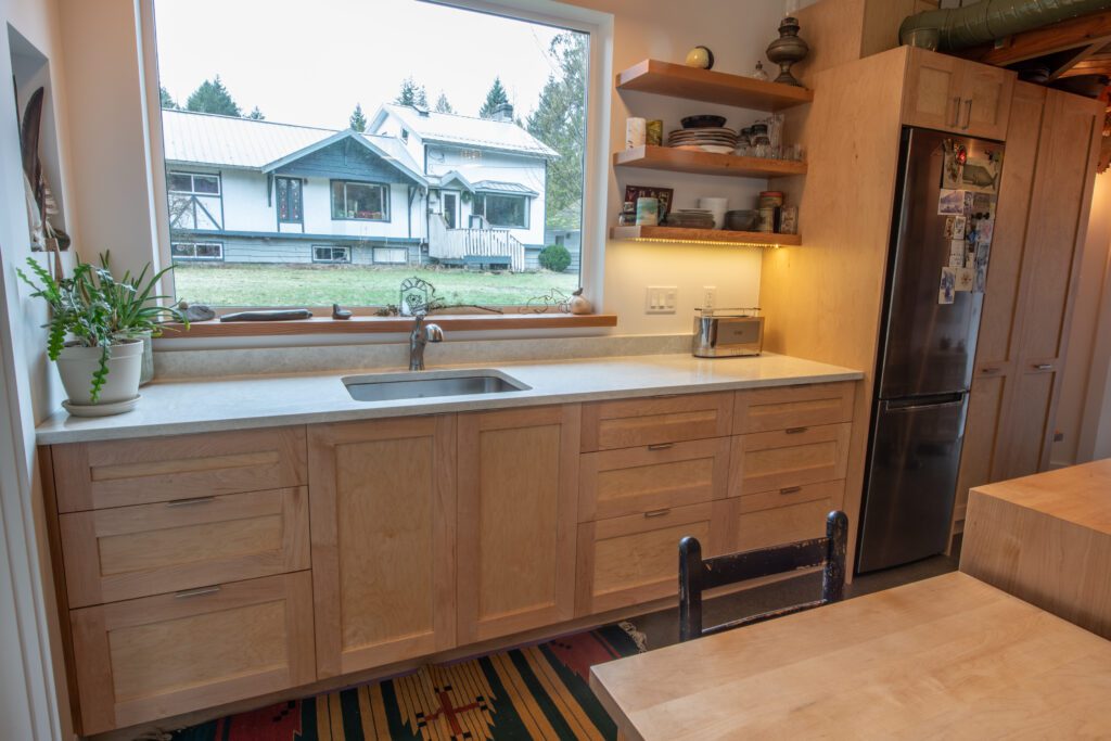 Unique post and beam cabin requiring new kitchen cabinets and bathroom vanity.
