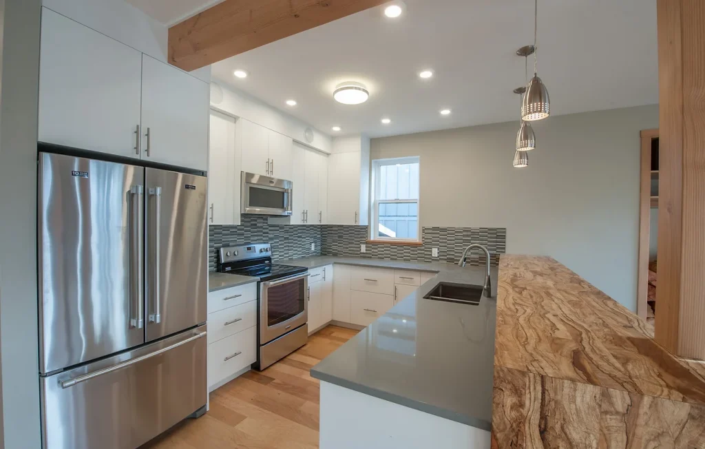 Kitchen cabinetry and built-in bench seating.
